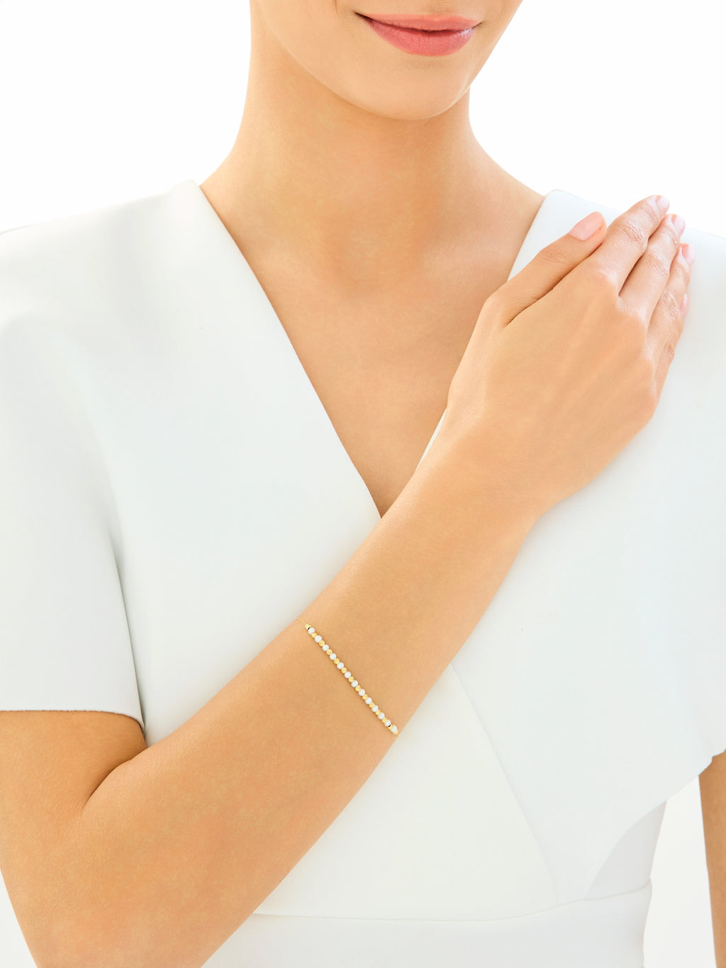 Bransoletka złota z perłami – kulki, żółte złoto 375